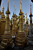 Inle Lake Myanmar. Indein, on the summit of a hill the  Shwe Inn Thein Paya a cluster of hundreds of ancient stupas. Many of them are ruined and overgrown with bushes. 